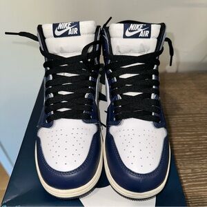 The "Jordan 1 Retro High OG Midnight Navy" is a high-top-Size 6.5